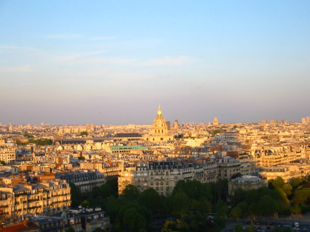 theshadowoftheeiffeltowerstretchesoverparisnearsunset.jpg